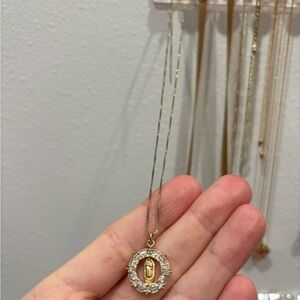 Elegant Gold and Silver Pendant Necklace with Mother Mary